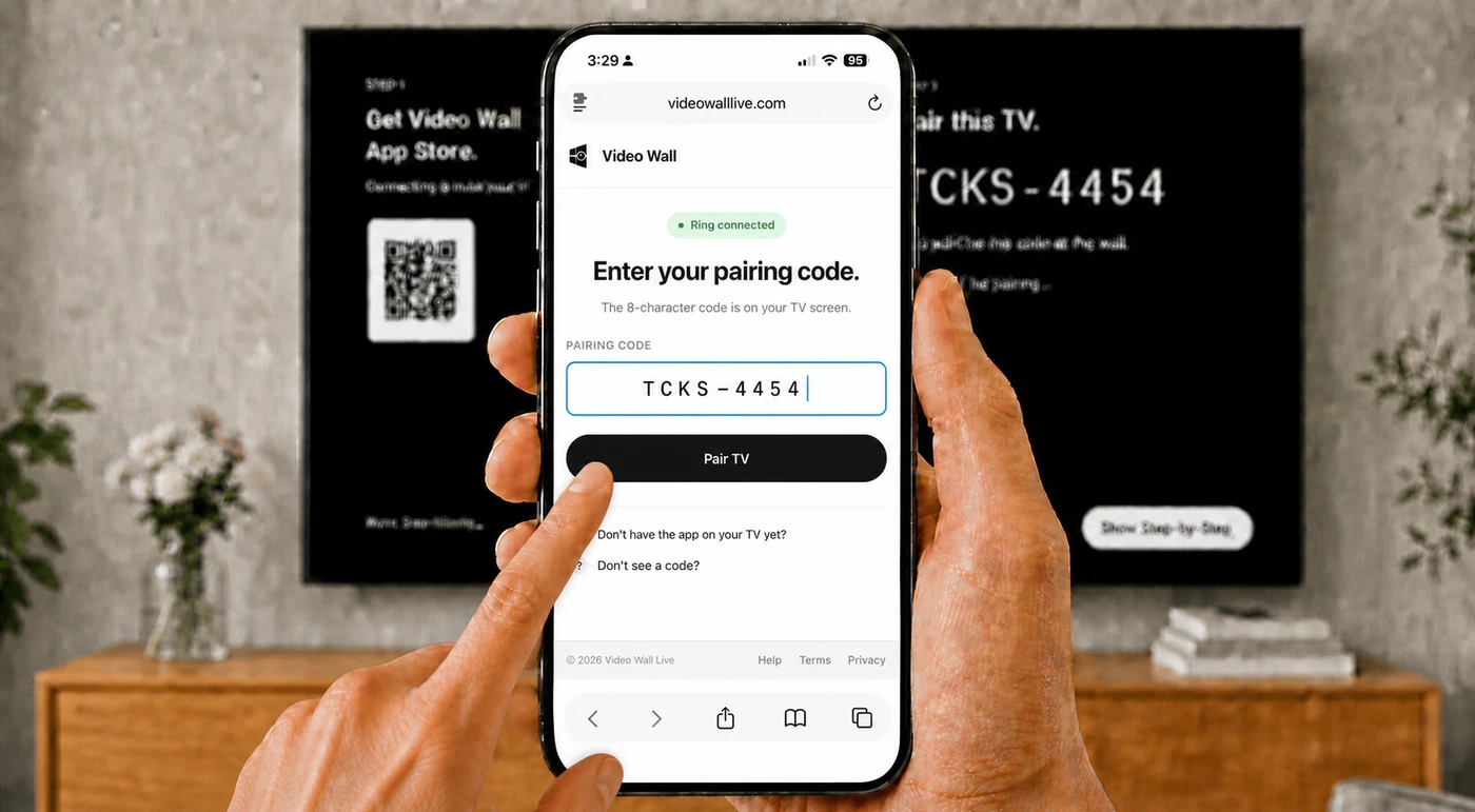 The Enter your pairing code page on a phone with the code typed in and the Pair TV button