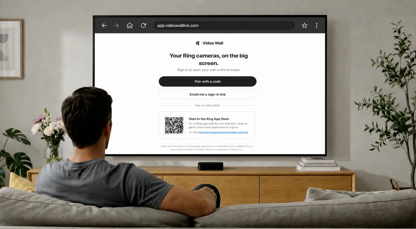 app.videowalllive.com in a TV browser, offering Pair with a code and Email me a sign-in link
